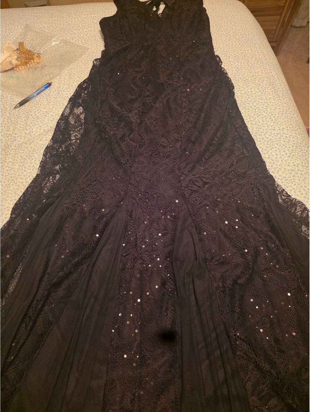 Elegant Black Lace Evening Gown with Sequin Accents and Sheer Panels